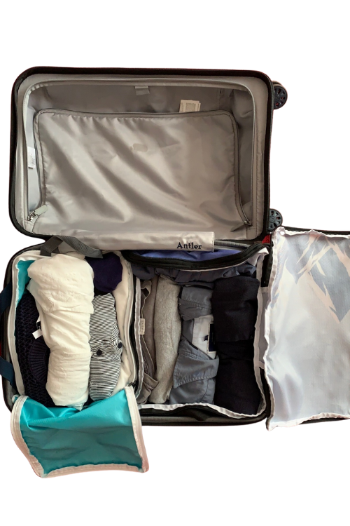 Image of rolled clothing in packing cube